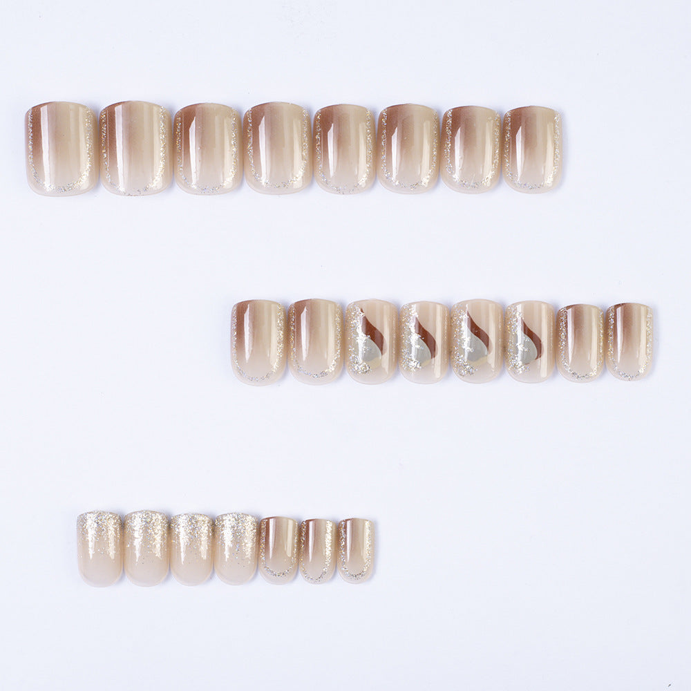 Elegant Nail Art with Glitter and Stylish Accents Stornfield