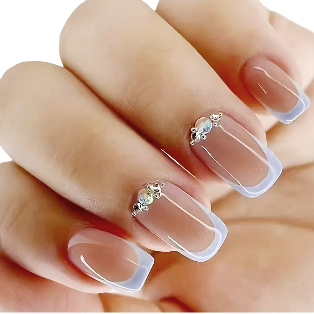 Elegant Rhinestone-Accented Acrylic Nail Extensions