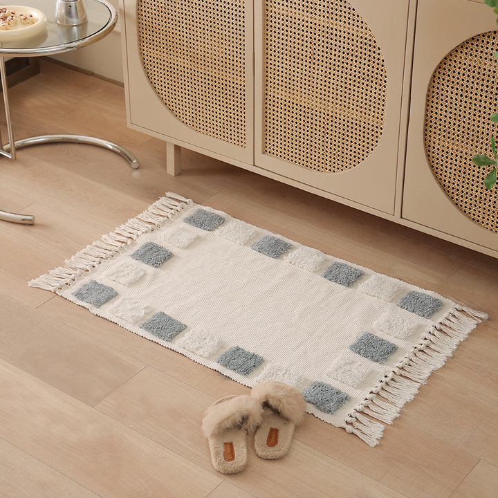 handwoven cotton runner with fringe and embossed relief pattern