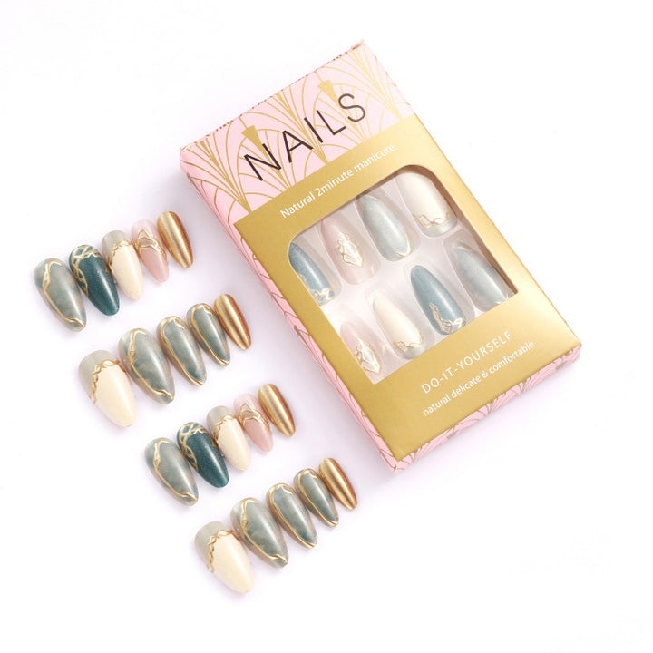 Artificial nails with elegant golden accents Stornfield
