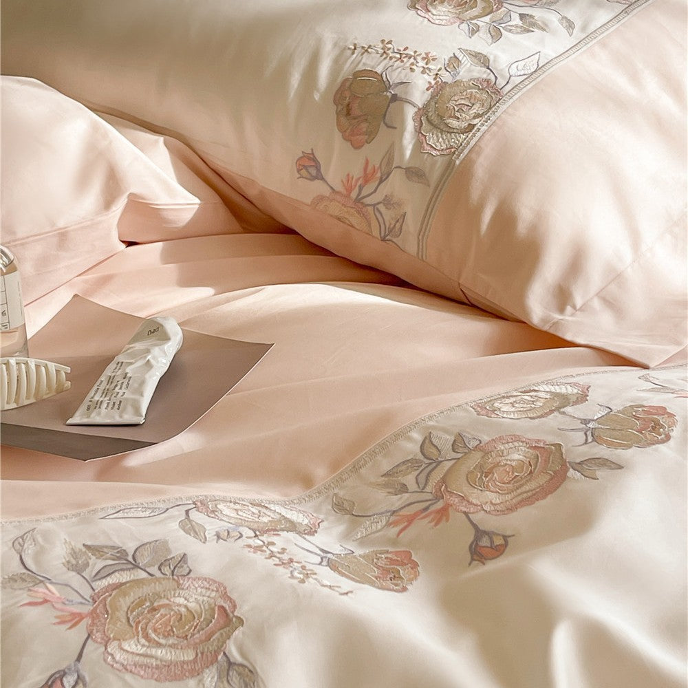 Premium bedding set made of cotton satin with floral border embroidery and reversible function