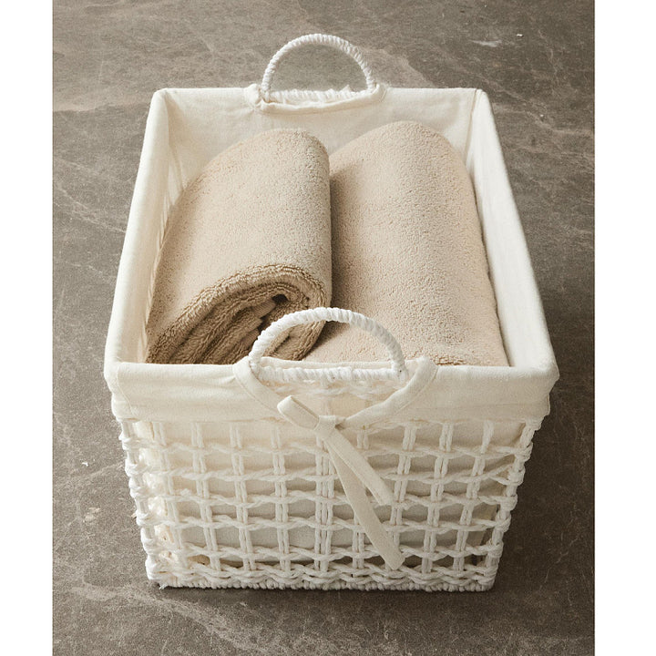 Handcrafted storage basket made of soft natural material Stornfield