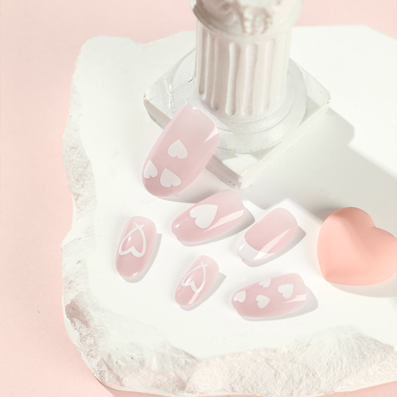 Elegant artificial nails with hearts and glitter Stornfield