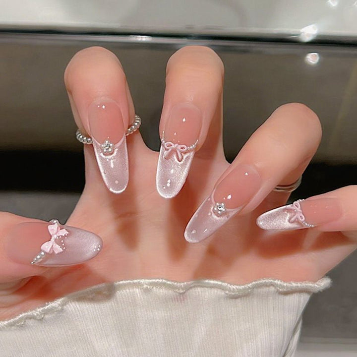 Artistic Stiletto Press-On Nail Art with Glimmering Accents Stornfield