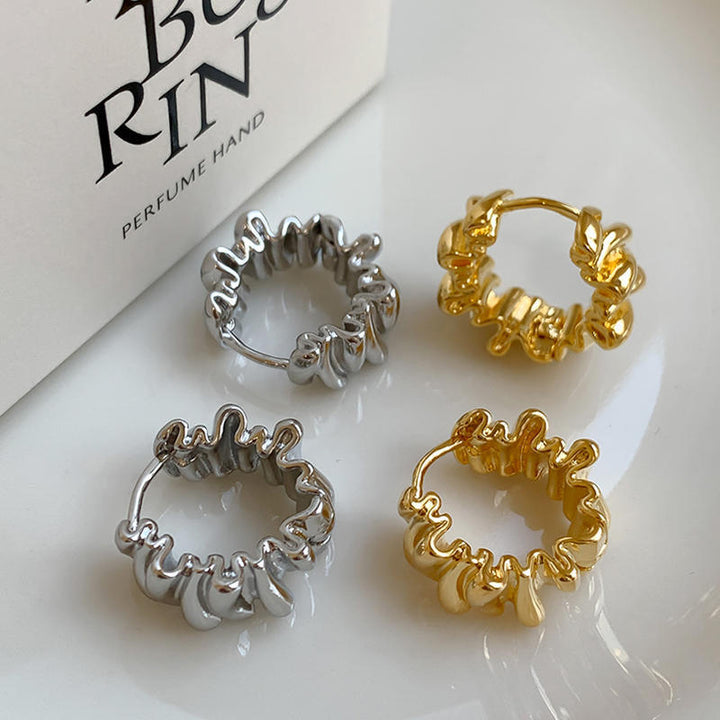 Stylish studs in modern ribbed design Stornfield