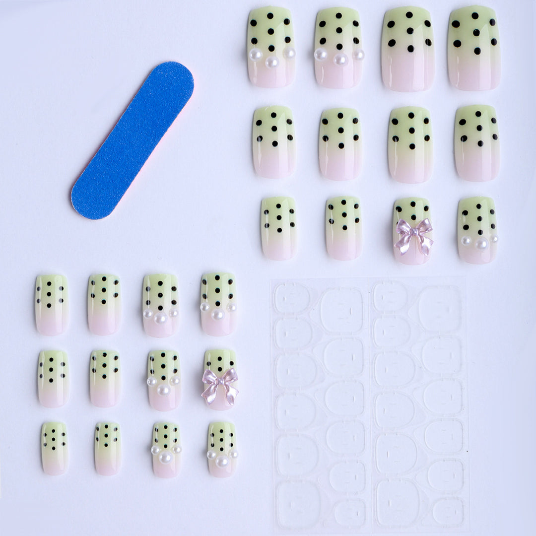 Artificial nails with playful dots and 3D elements Stornfield