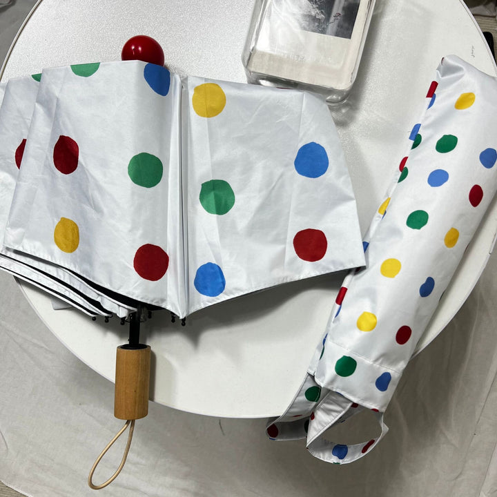 Ladies designer foldable umbrella with colorful polka dot pattern Stornfield