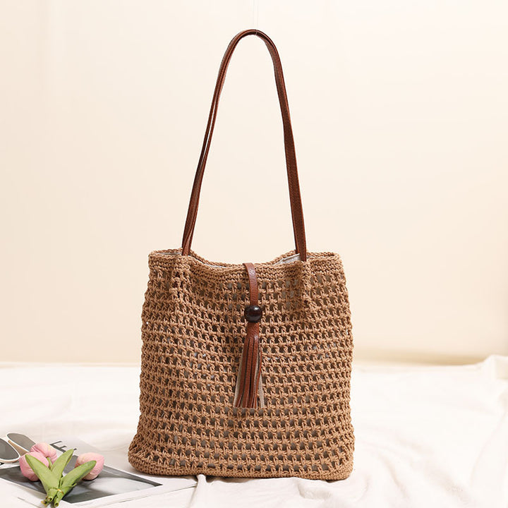 Hand-knotted basket bag with elegant leather handles Stornfield