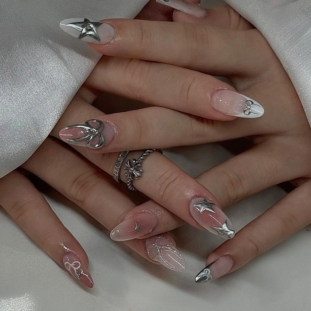 Artful nail extensions with elegant 3D embellishments Stornfield