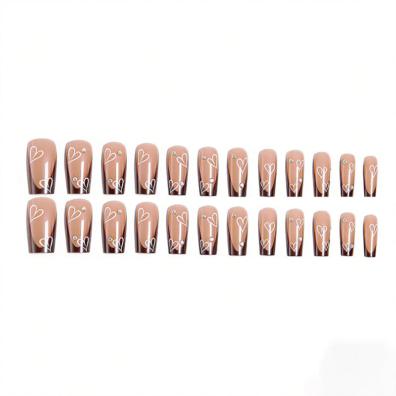 Elegant artificial nails with heart pattern and glitter accents Stornfield