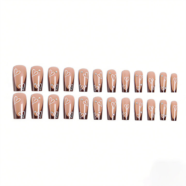 Elegant artificial nails with heart pattern and glitter accents Stornfield
