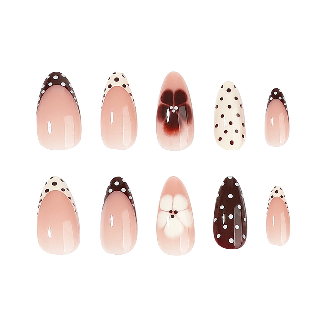 Artful nail art with floral design and various patterns Stornfield