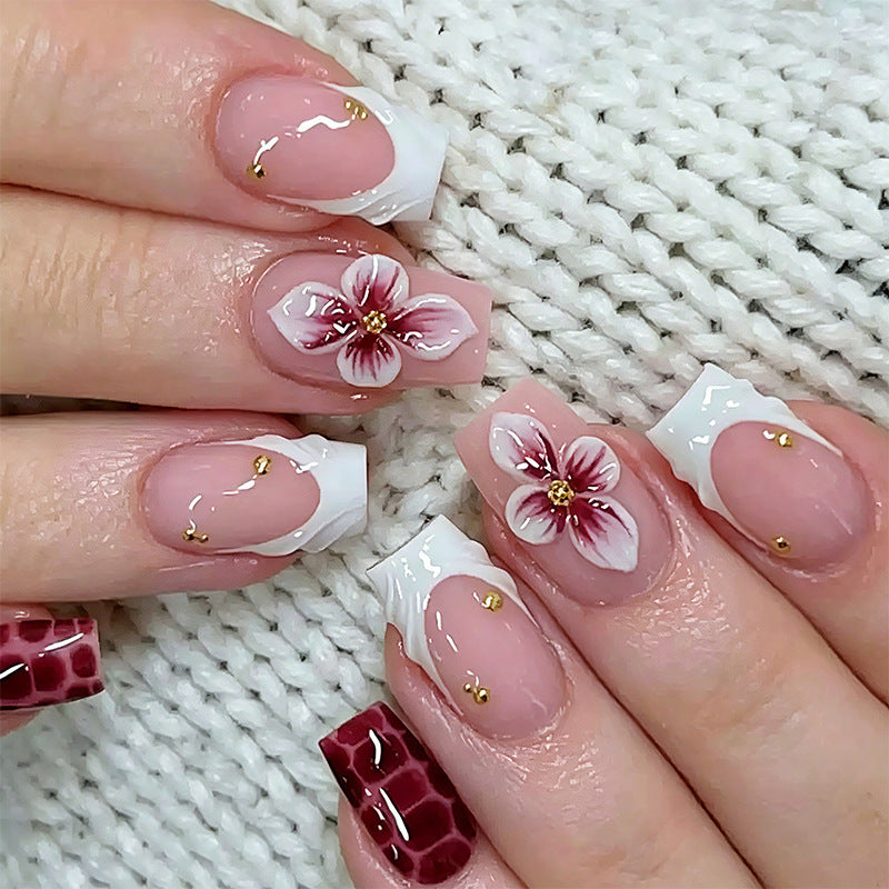 Exclusive artificial nails with elegant animal design and glitter accents Stornfield