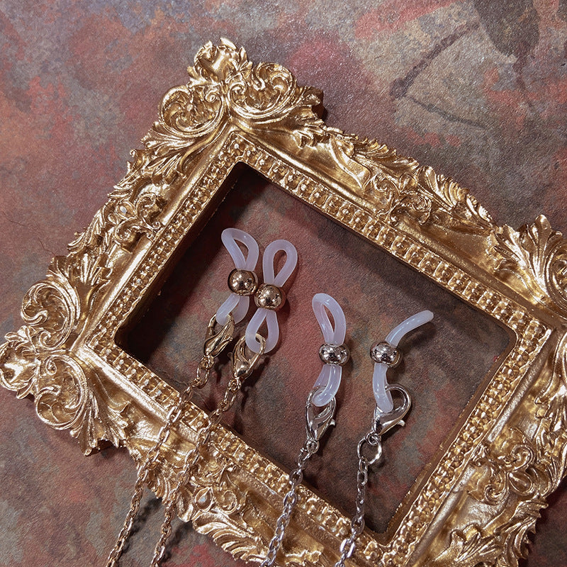 Elegant jewelry holder chain with red accents Stornfield