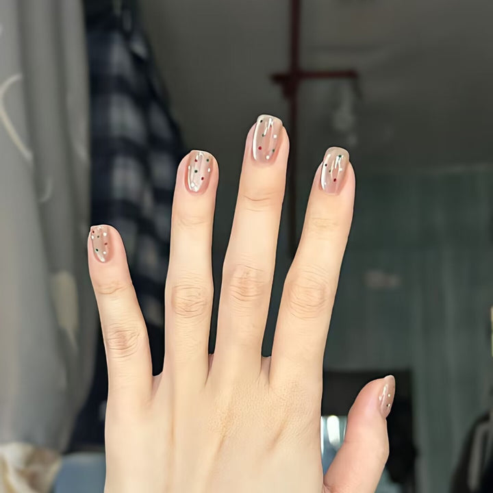 Trendy artificial nails with glitter effects Stornfield