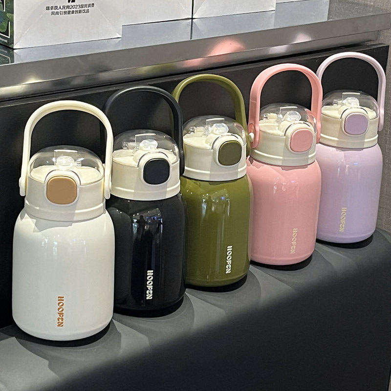 Women's insulated drinking container with practical carrying handle and cute design Stornfield