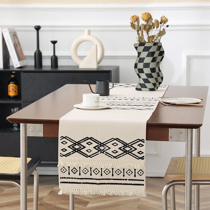 Woven table runner in Boho style with fringes and geometric ethnic print Stornfield