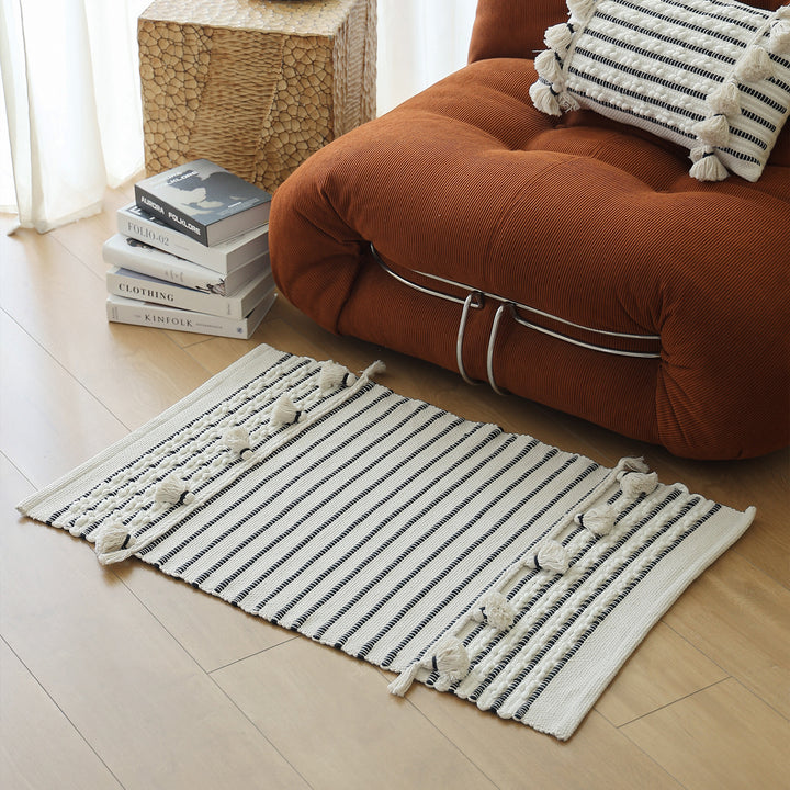 Woven runner with striped pattern, tassels and flat cotton structure Stornfield