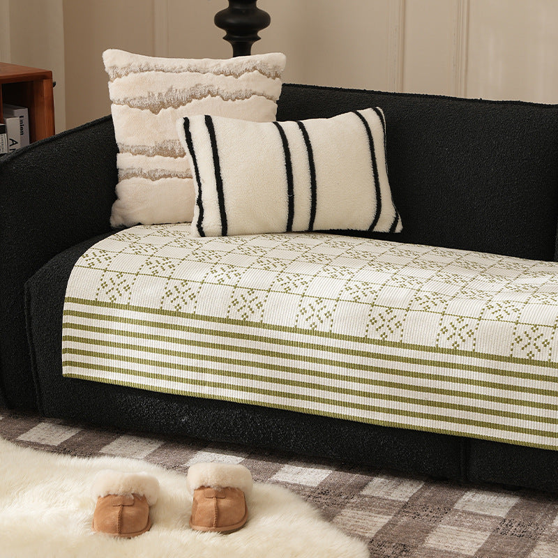 Woven rectangular table runner made of cotton blend with checkered pattern and striped border Stornfield