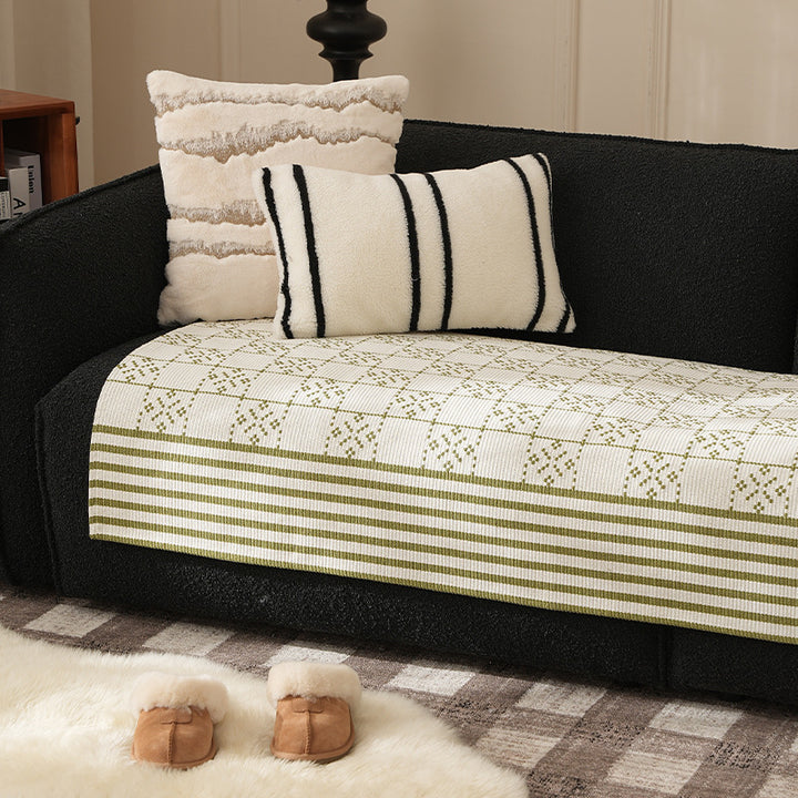 Woven rectangular table runner made of cotton blend with checkered pattern and striped border Stornfield