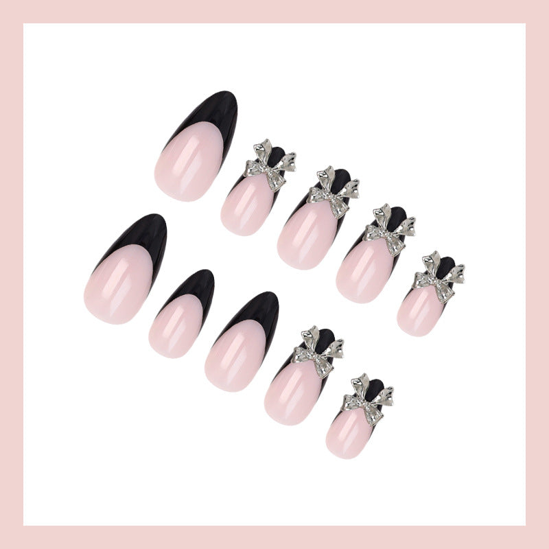 Nail art set with elegant tips and artistic embellishments Stornfield
