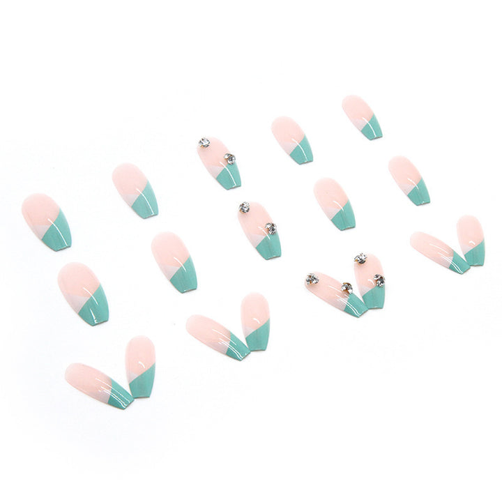 Artificial nail tips with glitter accents and elegant design Stornfield