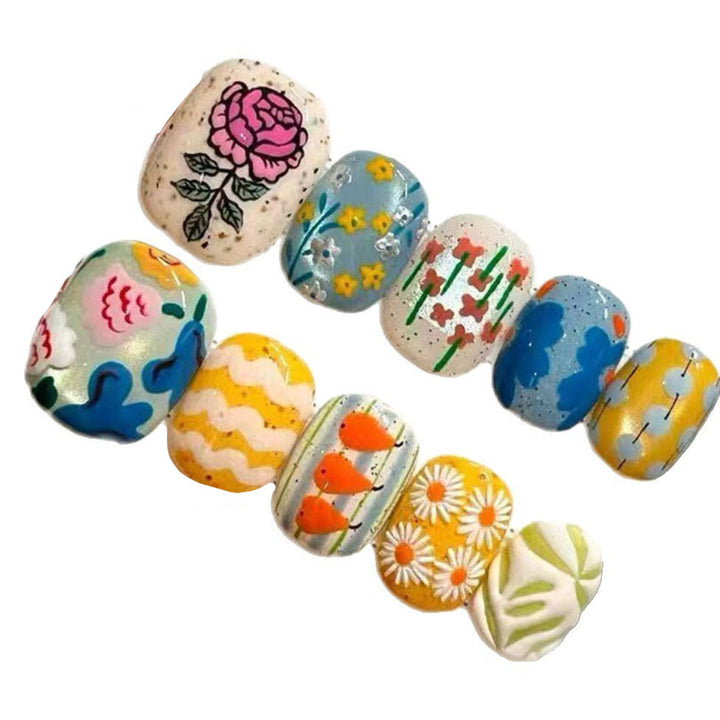 Artistic Floral and Nature-Inspired Nail Design Set Stornfield