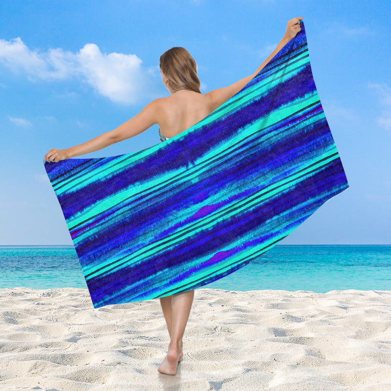 Women's beach towel with vibrant palm motif Stornfield