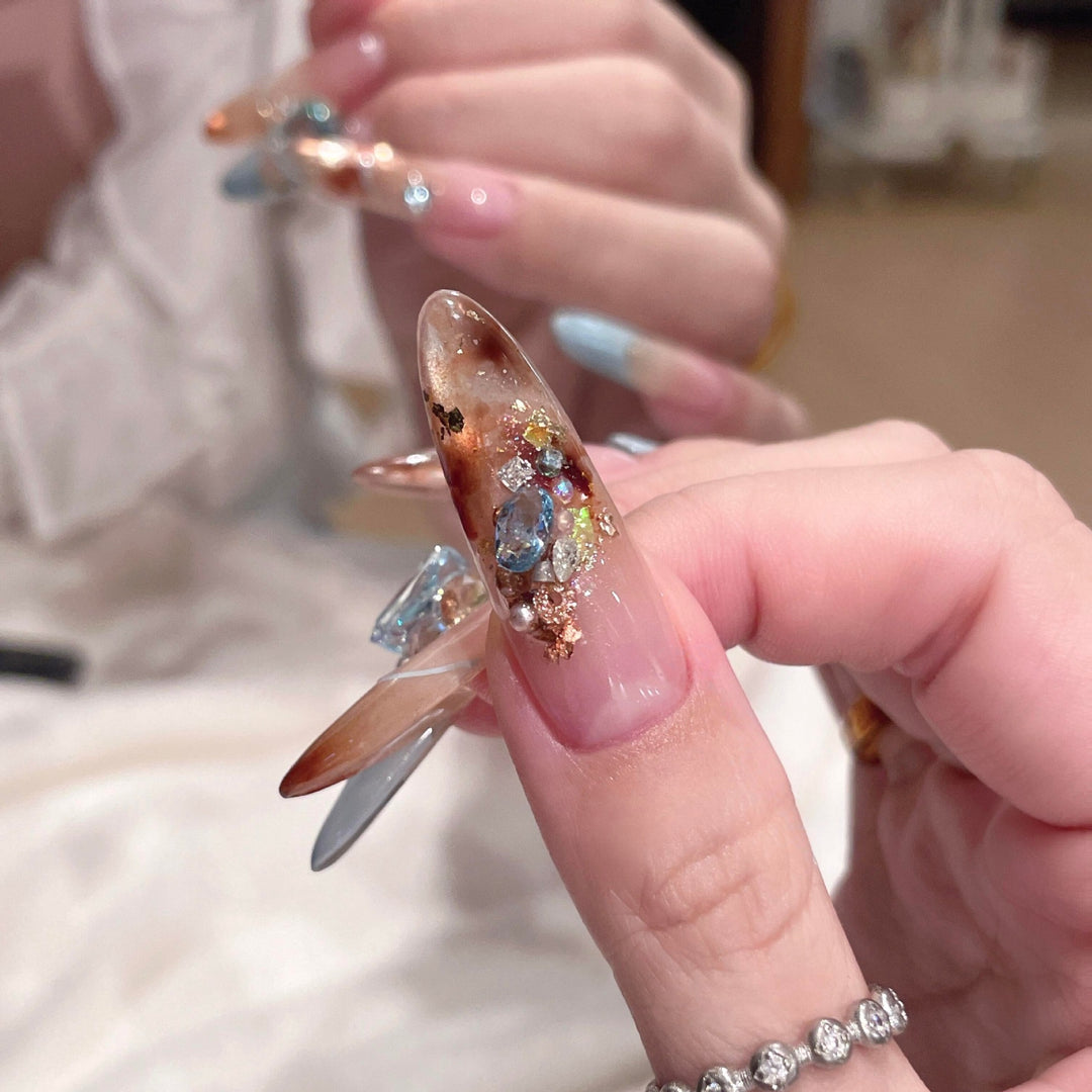 Glamorous artificial nails with glitter accents Stornfield