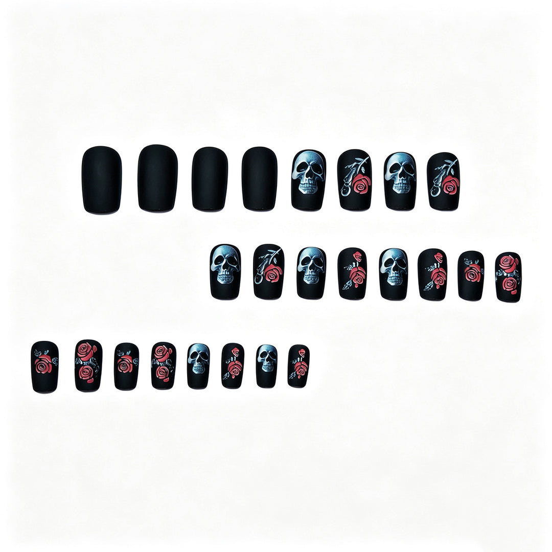 Creative nail art with skull and rose designs Stornfield