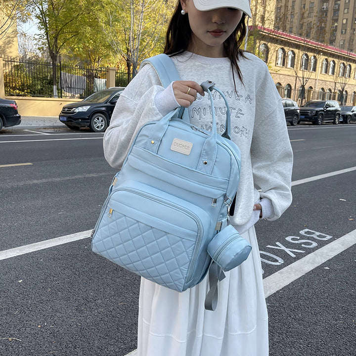 Versatile Quilted Backpack with Handy Side Pouch Stornfield