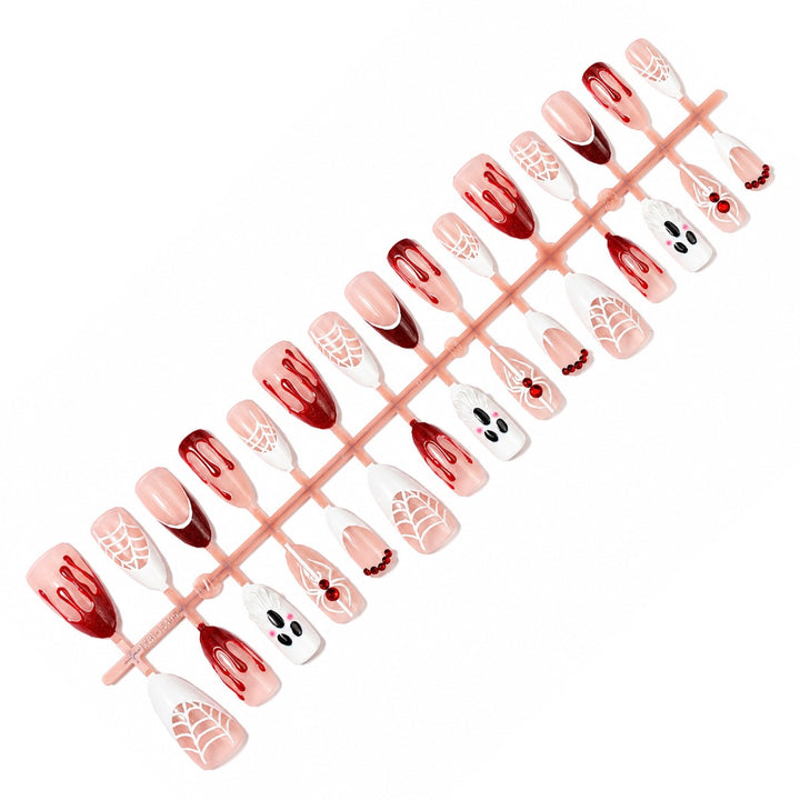 Creative nail art set with Halloween designs and glitter elements Stornfield
