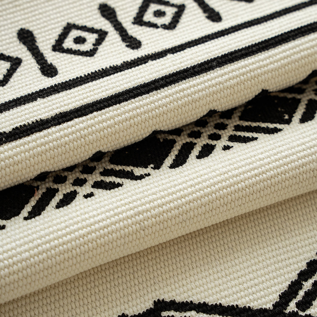 Boho table runner made of cotton blend with woven ethnic jacquard and decorative fringes Stornfield