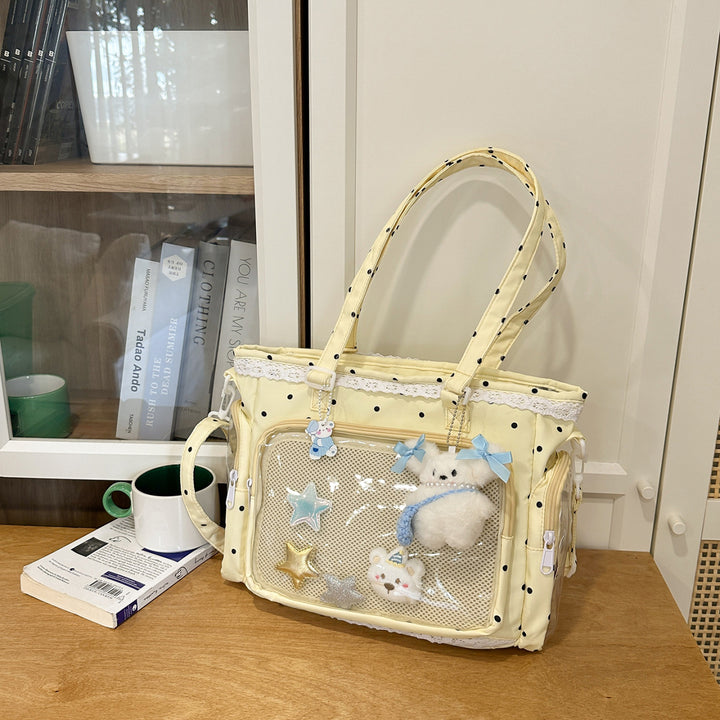 Handbag with Transparent Compartment Division and Playful Application Design Stornfield