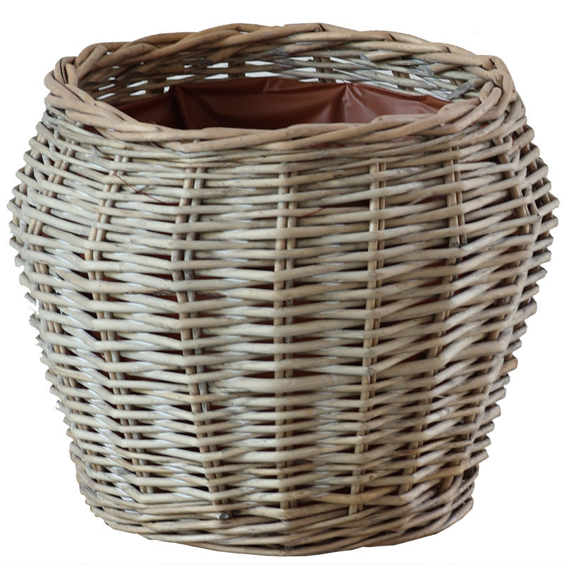 Stylish laundry basket made of braided natural material Stornfield