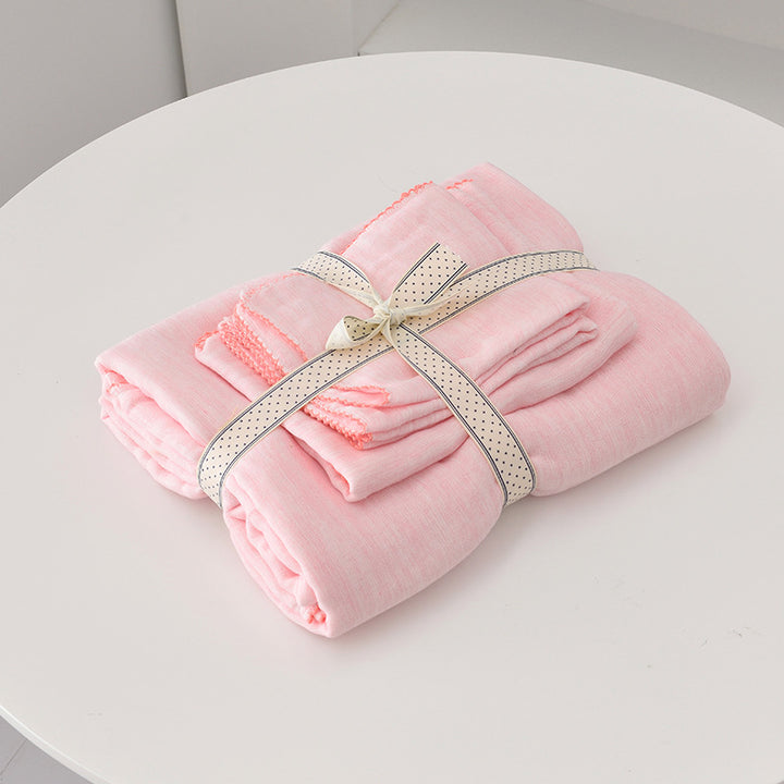 Baby cuddle cloth made of double-layered cotton muslin with fine decorative lace