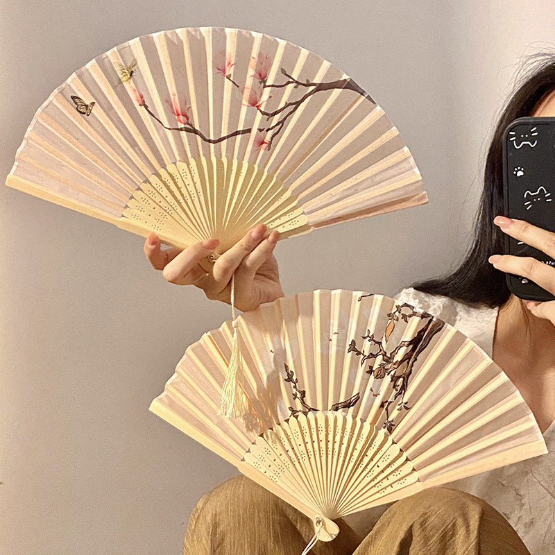 Handcrafted fan with elegant floral pattern Stornfield