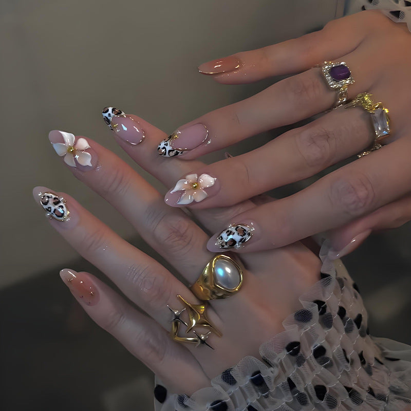 Nail art set with floral and animal accents Stornfield