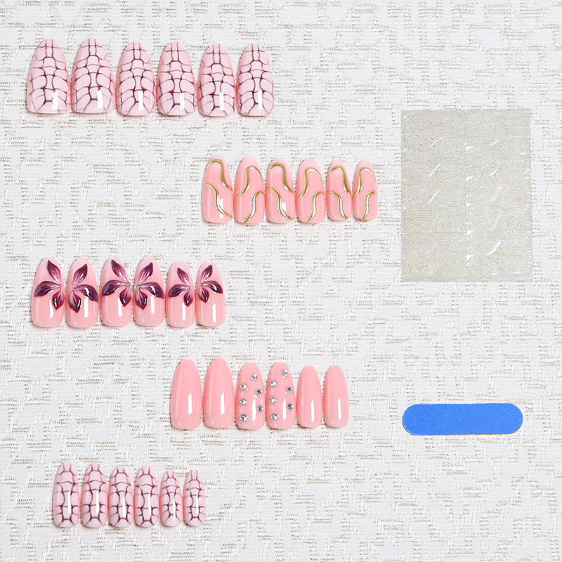 Acrylic nail set with glamorous design and sparkling accents Stornfield