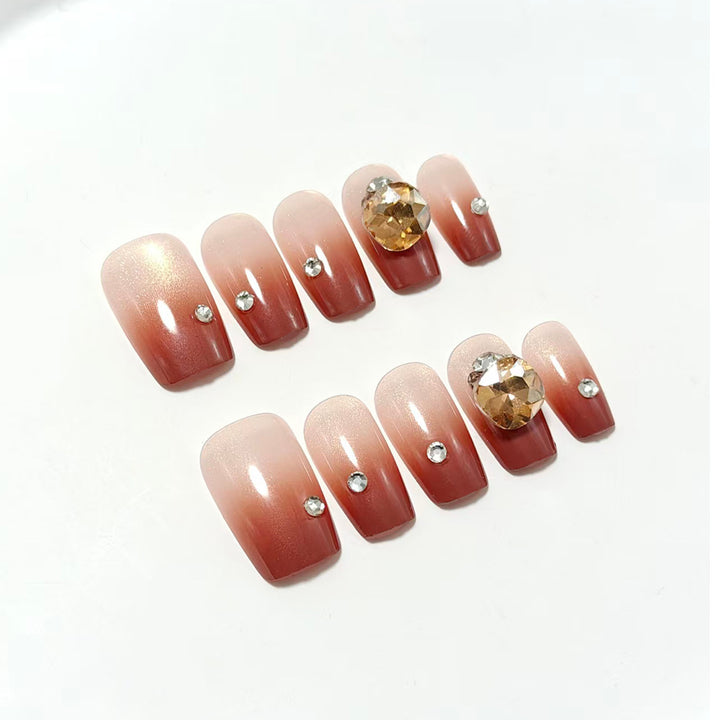 Artificial nail set with glittering rhinestone applications Stornfield
