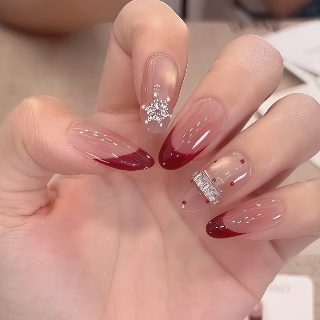 Artificial nails with festive design and rhinestone details Stornfield