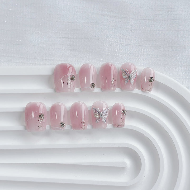 Elegant Press-On Nail Art Set with Butterfly and Gem Embellishments