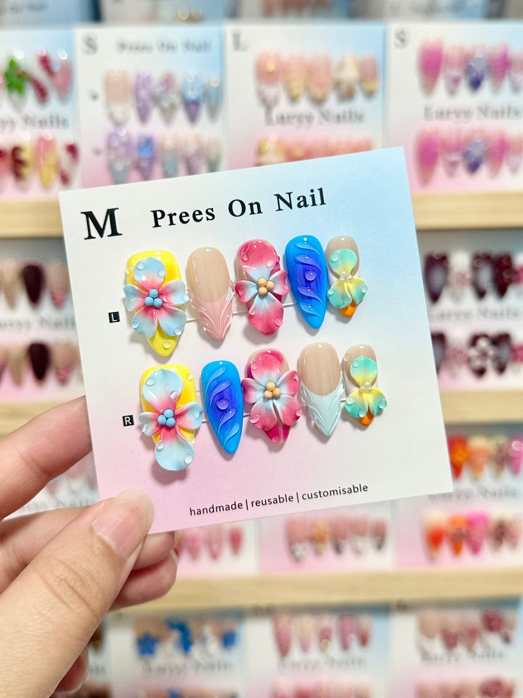 Artistic Press-On Nail Set with Floral and Green Accents