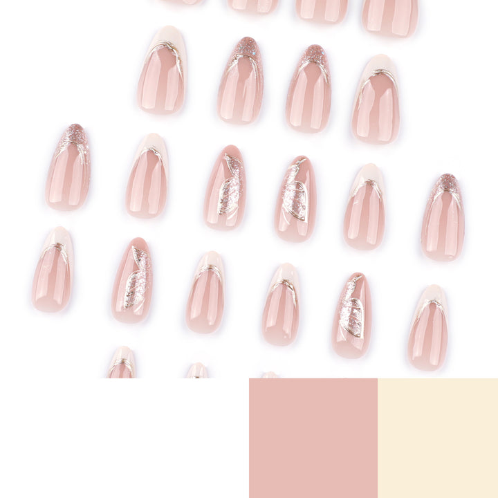 Elegant Stiletto Nails with Glitter and Spike Decorations Stornfield