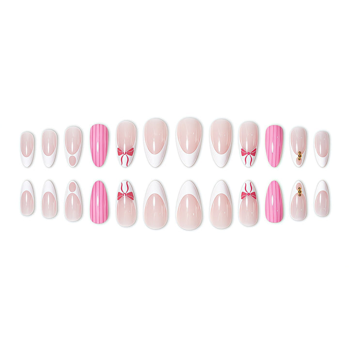 Elegant Stiletto Nail Art Enhancements with Decorative Accents Stornfield