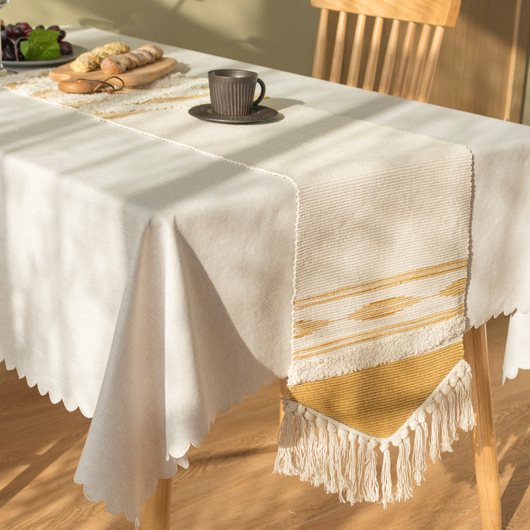 Handwoven cotton-linen table runner with fringes and textured decorative stripe