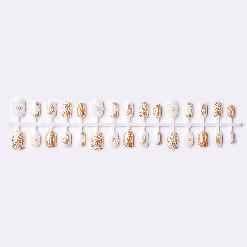 Elegant Press-On Nail Art Set with Gold Detailing Stornfield