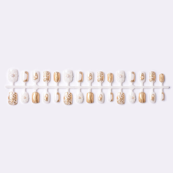 Elegant Press-On Nail Art Set with Gold Detailing Stornfield
