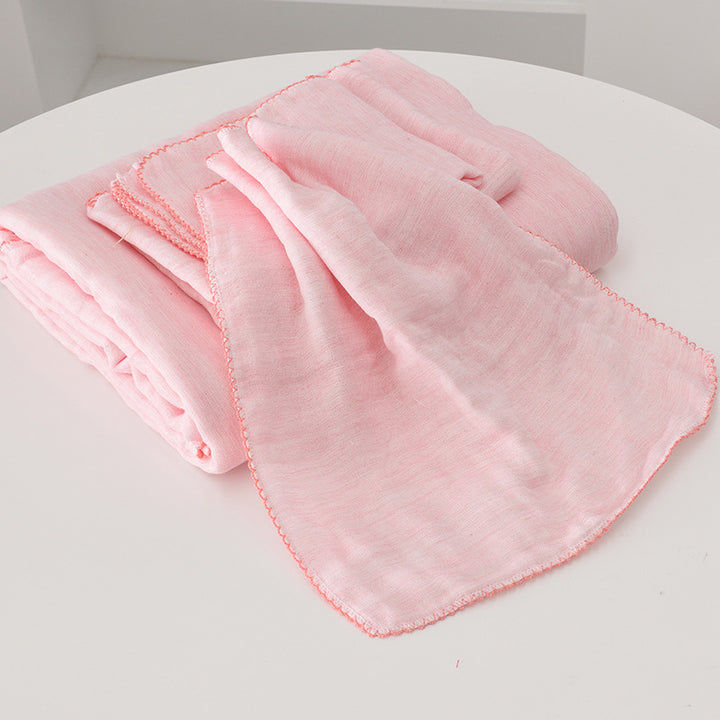 Baby cuddle cloth made of double-layered cotton muslin with fine decorative lace