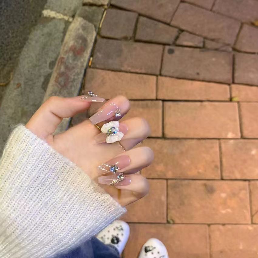 Elegant artificial nails with floral decor and glitter Stornfield